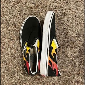 Vans slip ons. Women’s 8 and Men’s 6.5.